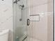 Modern bathroom with a glass-enclosed shower and updated fixtures at 512 Plantation Blvd, Lawrenceville, GA 30046