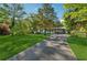 Inviting home with a spacious front yard and long driveway at 512 Plantation Blvd, Lawrenceville, GA 30046