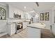 Modern kitchen with granite countertops, stainless steel appliances, and an island at 512 Plantation Blvd, Lawrenceville, GA 30046