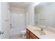 Clean bathroom with neutral paint, vanity with a wooden cabinet, and tub shower with curtain rod at 529 Ridge View Crossing Xing, Woodstock, GA 30188