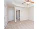 Large bedroom with tray ceilings, ceiling fan, neutral walls and carpet flooring at 529 Ridge View Crossing Xing, Woodstock, GA 30188