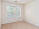 Neutral bedroom with a large window and beige carpet at 529 Ridge View Crossing Xing, Woodstock, GA 30188