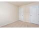 Neutral bedroom with two doors and beige carpet at 529 Ridge View Crossing Xing, Woodstock, GA 30188