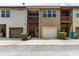 Exterior of a townhouse featuring a private garage, balcony, and neutral-toned siding at 529 Ridge View Crossing Xing, Woodstock, GA 30188
