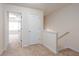 Upstairs hallway with neutral paint and carpet with access to rooms at 529 Ridge View Crossing Xing, Woodstock, GA 30188