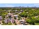 Panoramic aerial view of a vibrant cityscape, lush green trees, and quaint buildings, creating a harmonious blend at 1405 May Se Ave, Atlanta, GA 30316