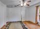 Room with hardwood floors, a ceiling fan, and a light-blocking curtain covering the window at 1405 May Se Ave, Atlanta, GA 30316