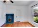 Cozy room with hardwood floors, a decorative fireplace, and a bright window at 1405 May Se Ave, Atlanta, GA 30316