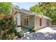 Inviting craftsman bungalow featuring a spacious front porch with classic columns and trim at 1405 May Se Ave, Atlanta, GA 30316
