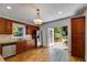 Bright kitchen featuring stainless steel appliances, wood cabinets, hardwood floors, and direct access to a deck at 1405 May Se Ave, Atlanta, GA 30316