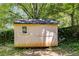 Exterior of wooden shed with double doors and a window at 1405 May Se Ave, Atlanta, GA 30316