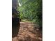 Scenic view of the neighborhood community with trees and grassy areas at 206 River Run Dr, Atlanta, GA 30350