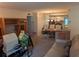 Open concept living room with furniture, shelving and dining area at 206 River Run Dr, Atlanta, GA 30350