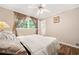Bright bedroom with a full bed and natural light from the window at 265 Tamea Trl, Covington, GA 30014