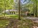 Charming single-story house with large front yard and mature trees at 265 Tamea Trl, Covington, GA 30014