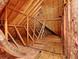 View of the attic showing the exposed roof framework at 6772 Blantyre Boulevard Blvd, Stone Mountain, GA 30087