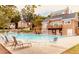 View of the Community pool with lots of lounge chairs at 6772 Blantyre Boulevard Blvd, Stone Mountain, GA 30087