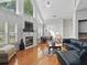 Bright living room with a fireplace, large windows, and comfortable seating at 6772 Blantyre Boulevard Blvd, Stone Mountain, GA 30087