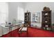 Bright home office with desk, shelving, books and natural lighting at 6772 Blantyre Boulevard Blvd, Stone Mountain, GA 30087