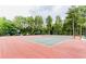 Brightly painted community tennis court offers an engaging activity for residents at 6772 Blantyre Boulevard Blvd, Stone Mountain, GA 30087