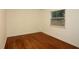 Bedroom with hardwood floors, white trim and walls, and natural light from the window at 819 Durant Ne # 819-6, Atlanta, GA 30308