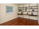 Bedroom with hardwood floors, and a built-in shelving and desk unit at 819 Durant Ne # 819-6, Atlanta, GA 30308