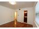 Bedroom with hardwood floors, built in shelving and cabinets, and a closet at 819 Durant Ne # 819-6, Atlanta, GA 30308