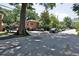 Palisades Park condos with brick exterior, mature tree, landscaping, and parking at 819 Durant Ne # 819-6, Atlanta, GA 30308