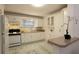 Charming kitchen with white cabinets, breakfast bar, and decorative accents at 819 Durant Ne # 819-6, Atlanta, GA 30308
