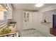 Bright kitchen featuring ample cabinetry, patterned flooring, and sleek countertops at 819 Durant Ne # 819-6, Atlanta, GA 30308