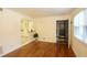 Bright living room features hardwood floors, white walls and trim and lots of natural light at 819 Durant Ne # 819-6, Atlanta, GA 30308