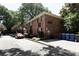 Well-maintained brick condo building surrounded by mature trees and beautiful landscaping at 819 Durant Ne Pl # 819-6, Atlanta, GA 30308