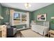 Cozy Bedroom with green walls, a large window, and a white crib at 1055 Delmont Ter, Roswell, GA 30075