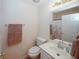 Well-lit bathroom with a single vanity, toilet, and shower/tub combo at 2191 Rockbridge Rd # 103, Stone Mountain, GA 30087