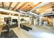 Unfinished basement with exposed ductwork, workout equipment, and storage space at 3707 Dunwoody Club Dr, Atlanta, GA 30350