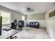 Versatile bonus room with neutral colors, a ceiling fan, and plenty of space for relaxing or working at 3707 Dunwoody Club Dr, Atlanta, GA 30350