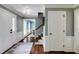 Bright foyer showcasing hardwood floors, crisp white trim, and light blue walls at 3707 Dunwoody Club Dr, Atlanta, GA 30350