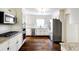 Spacious kitchen with stainless steel appliances, subway tile backsplash, and granite countertops at 3707 Dunwoody Club Dr, Atlanta, GA 30350