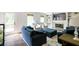 Cozy living room with fireplace, built-in bookshelves, and comfortable seating at 3707 Dunwoody Club Dr, Atlanta, GA 30350