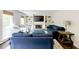 Inviting living room featuring a fireplace, built-ins, and plush furniture at 3707 Dunwoody Club Dr, Atlanta, GA 30350