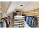 Spacious walk-in closet with shelving and center island for storage at 3707 Dunwoody Club Dr, Atlanta, GA 30350