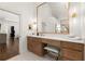 Bathroom vanity with ample counter space, seated vanity, and marble countertops at 5120 Falcon Chase Ln, Atlanta, GA 30342