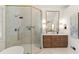 Bathroom featuring a tile shower, bathtub, and wood vanity with marble countertops at 5120 Falcon Chase Ln, Atlanta, GA 30342