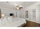 Bedroom with a view of the ensuite bathroom, a television and king bed at 5120 Falcon Chase Ln, Atlanta, GA 30342