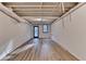 Unfinished basement with concrete flooring, exposed ceiling, and a small window at 315 N Fayette Dr, Fayetteville, GA 30214