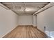 Unfinished basement featuring painted ceiling beams and neutral flooring at 315 N Fayette Dr, Fayetteville, GA 30214