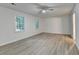 Bedroom featuring gray flooring, two windows, and plenty of natural light at 315 N Fayette Dr, Fayetteville, GA 30214