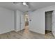 Bedroom featuring wood-look floors and views to the walk-in closet at 315 N Fayette Dr, Fayetteville, GA 30214