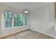 Well-lit dining area featuring bright light and windows overlooking backyard at 315 N Fayette Dr, Fayetteville, GA 30214