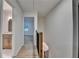 Bright hallway with hardwood floors, leading to a bathroom and bedroom at 315 N Fayette Dr, Fayetteville, GA 30214